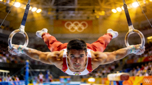 奥运会男子体操吊环项目精彩集锦，运动员展示出完美的力量与平衡